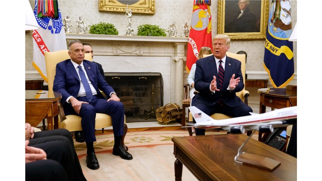 FILE - President Donald Trump meets with Iraqi Prime Minister Mustafa Kadhimi in the Oval Office of the White House, Aug. 20, 2020.
