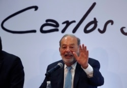 FILE - Mexican billionaire Carlos Slim speaks at a press conference in Mexico City, April 16, 2018.