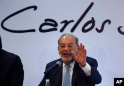 FILE - Mexican billionaire Carlos Slim speaks at a press conference in Mexico City, April 16, 2018.