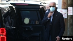 U.S. President-elect Joe Biden exits The Queen theatre following a virtual meeting with frontline healthcare workers in Wilmington, Delaware, Nov. 18, 2020.