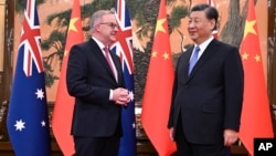 FILE - Australia's Prime Minister Anthony Albanese, left, meets with China's President Xi Jinping at the Great Hall of the People in Beijing, China, on Nov. 6, 2023. Albanese on Monday, Nov. 20, criticized China for a “dangerous” encounter between Chinese and Australian warships.