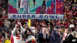 FILE - Kansas City Chiefs players and staff celebrate after the NFL Super Bowl 57 football game against the Philadelphia Eagles, February 12, 2023, in Glendale, Arizona. (AP Photo/Seth Wenig)
