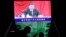 北京街頭巨型屏幕播放的中國領導人習近平參加中共19屆六中全會的圖像。（2021年11月11日）