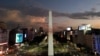 A drone view shows an image of Pope Francis displayed with a digital video-mapping at the Obelisco as the worlds pray for the pontiff’s health, in Buenos Aires, Argentina, Feb. 21, 2025. 