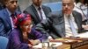 FILE - United Nations Deputy Secretary-General Amina Mohammed, left, addresses the Security Council meeting on peace and security in Africa, Aug. 10, 2017, at U.N. headquarters. 