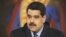 FILE - Venezuela's President Nicolas Maduro speaks during a meeting at Miraflores Palace, in Caracas, in this handout picture provided by Miraflores Palace, Feb. 17, 2016. 