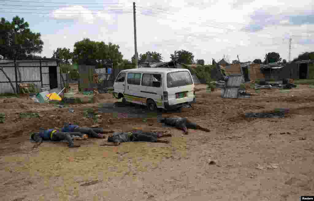 Slain bodies of civilians lie along a road in Bentiu, Unity state of South Sudan.