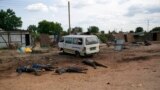 Bodies of civilians who were killed in a surge in Unity state last year, lie at the side of the road in the state capital Bentiu. 