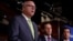 FILE - Rep. Ruben Kihuen (R) and Rep. Eric Swalwell (C) listen as Rep. Joe Crowley addresses recent revelations about President Donald Trump's involvement with Russia on Capitol Hill in Washington, D.C., U.S. May 17, 2017. 