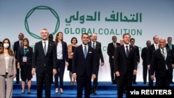 NATO Secretary General Jens Stoltenberg, Italian Foreign Minister Luigi Di Maio and U.S. Secretary of State Antony Blinken pose for a group photo at the Ministerial meeting of the global coalition on Syria and Islamic state, in Rome, June 28, 2021.