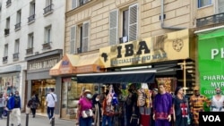 A street in Goutte d'Or features North and sub-Saharan African stores, offering a melting pot of different African nationalities, in Paris. (Lisa Bryant/VOA)