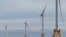 FILE - Turbines operate at the Block Island Wind Farm, December 7, 2023, off the coast of Block Island, Rhode Island. Nations have signed on to triple renewable energy by 2030.