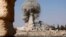 An image distributed by Islamic State militants on social media on August 25, 2015 purports to show the destruction of a Roman-era temple in the ancient Syrian city of Palmyra. 