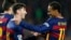 File photo: FC Barcelona's Lionel Messi, left, is congratulated by his teammate Neymar, after scored during a Spanish La Liga soccer match against Real Sociedad at the Camp Nou stadium in Barcelona, Spain, Nov. 28, 2015. (AP Photo/Manu Fernandez)