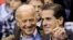 FILE - Then-U.S. Vice President Joe Biden and his son Hunter Biden attend an NCAA basketball game between Georgetown University and Duke University in Washington, Jan. 30, 2010. 