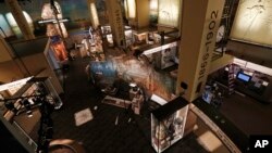 In this Nov. 7, 2017 photograph, media and invited guests were able to get a "sneak peak" into the state's two new history museums, the Museum of Mississippi History, seen, and the Mississippi Civil Rights Museum, in Jackson, Miss.