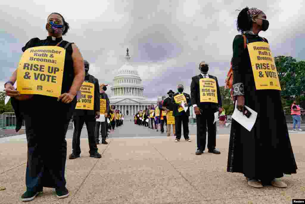Religious leaders gather outside the U.S. Capitol to protest the Senate's actions related to the Supreme Court, police reform and immigration, in Washington, Sept. 29, 2020.