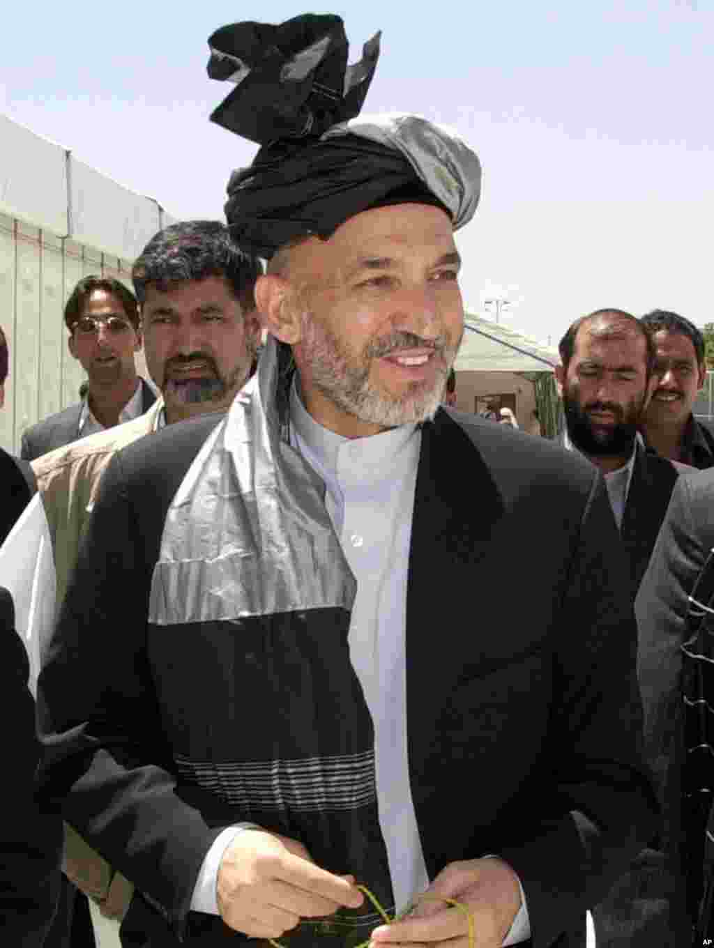June, 2002 --  A grand council, known as a loya jirga, elects Hamid Karzai to lead Afghanistan’s transitional administration.  The body will draft a new constitution and pave the way for elections in the next 18 months.