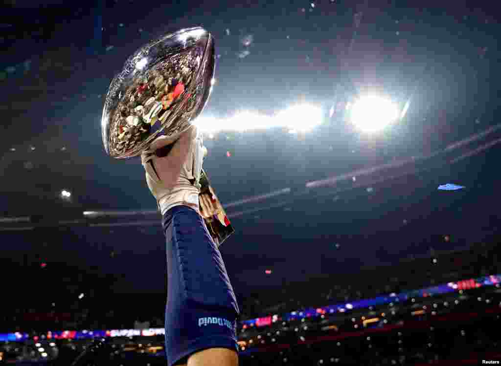 The New England Patriots celebrate with the Vince Lombardi Trophy after beating the Los Angeles Rams in Super Bowl LIII at Mercedes-Benz Stadium in Atlanta, Georgia, Feb. 3, 2019. (Matthew Emmons-USA TODAY Sports)