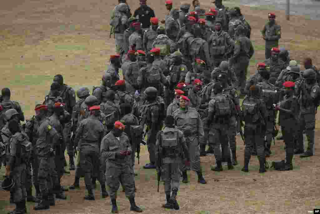 Soldiers attend a briefing at Limbe Omnisport Stadium ahead of the soccer match between Gambia and Mali. Jan. 16, 2022.