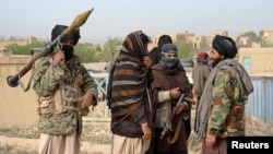 Members of the Taliban gather in Ghazni province, Afghanistan, April 18, 2015. Iran, according to Afghan lawmakers, is supplying sophisticated weapons to the Taliban. 