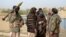 FILE - Members of the Taliban gather in Ghazni province, Afghanistan, April 18, 2015. Afghan officials and lawmakers continue to question and denounce Russia’s recent disclosure that it maintains “limited political” contacts with the Taliban.