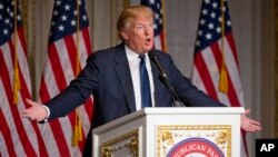 FILE - Republican presidential candidate Donald Trump speaks during the Palm Beach County GOP Lincoln Day Dinner at the Mar-A-Lago Club in Palm Beach, Florida, March 20, 2016.