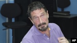 In this image released by Guatemala's National Police, software company founder John McAfee is pictured after being arrested for entering the country illegally in Guatemala City, Dec. 5, 2012.