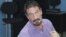 In this image released by Guatemala's National Police, software company founder John McAfee is pictured after being arrested for entering the country illegally in Guatemala City, December 5, 2012.