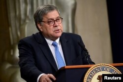 FILE - U.S. Attorney General William Barr speaks at the Justice Department in Washington, July 15, 2019.