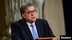 FILE - U.S. Attorney General William Barr speaks at the Justice Department in Washington, July 15, 2019.