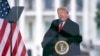 FILE - Then-President Donald Trump speaks during a rally protesting the electoral college certification of Joe Biden as President in Washington, Jan. 6, 2021. 