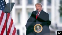 FILE - President Donald Trump speaks during a rally protesting the electoral college certification of Joe Biden as president in Washington, Jan. 6, 2021.