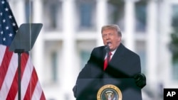 FILE - In this Jan. 6, 2021, photo President Donald Trump speaks during a rally protesting the electoral college certification of Joe Biden as President in Washington.