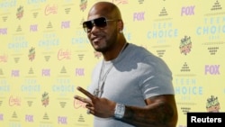 FILE - Rapper Flo Rida arrives at the 2015 Teen Choice Awards in Los Angeles, California, United States Aug. 16, 2015. 
