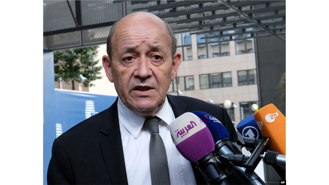 French Foreign Minister Jean-Yves Le Drian speaks with the press before meeting with German Foreign Minister Heiko Maas, British Foreign Secretary Boris Johnson, European Union foreign policy chief Federica Mogherini and Iranian Foreign Minister Javad Zarif earlier in May..