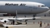 An Airbus A340 airplane of Mahan Air is seen at Si