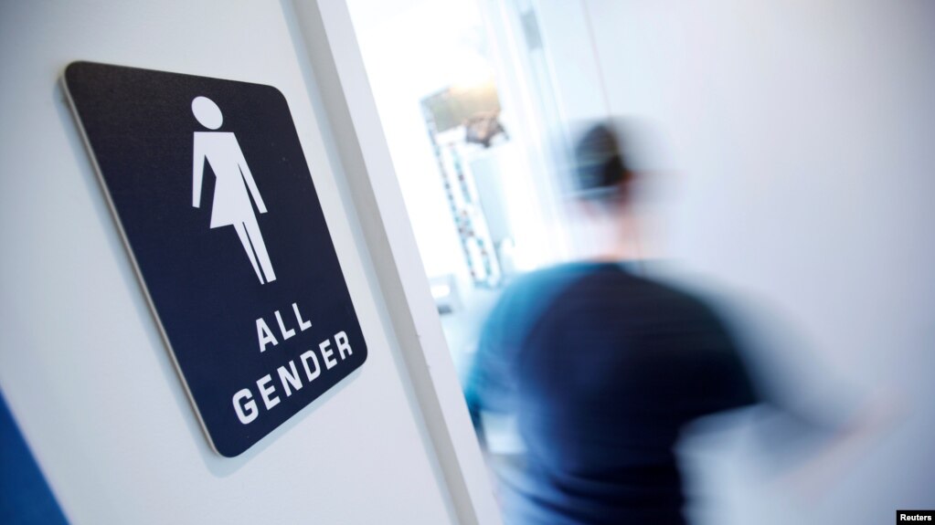 file a bathroom sign welcomes both genders at the cacao cinnamon coffee shop in durham - Transgender Bathroom Sign file a bathroom sign welcomes both genders at the cacao cinnamon coffee shop in durham - Transgender Bathroom Sign