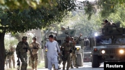 Afghan security forces arrive near the site of an attack in Jalalabad city, Afghanistan, Sept. 18, 2019. 