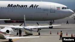 An Airbus A340 airplane of Mahan Air is seen at Simon Bolivar International Airport outside Caracas, Venezuela, April 8, 2019. 