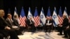 TOPSHOT - National Security Advisor Jake Sullivan (2nd L), US Secretary of State Antony Blinken (3rd L) and US President Joe Biden (4th L) listen to Israel's Prime Minister Benjamin Netanyahu as they join a meeting of the Israeli war cabinet in Tel Aviv 