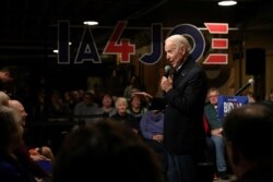 FILE PHOTO: Democratic U.S. presidential candidate and former U.S. Vice President Joe Biden speaks during a town hall in Independence, Iowa, U.S. Jan. 3, 2020.