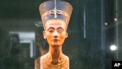 FILE - A bust of ancient Egyptian Queen Nefertiti at the New Museum in Berlin, Sept. 10, 2014.