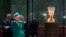 FILE - Queen Margrethe II of Denmark looks at the bust of Nefertiti, as she visits the New Museum in Berlin, Sept. 10, 2014.