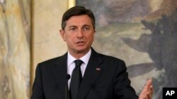 FILE - Slovenian President Borut Pahor speaks during a news conference after talks with Austrian President elect Alexander van der Bellen in Vienna, Austria, Jan. 10, 2017.