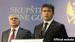 FILE - Opposition leaders Andrija Mandic and Nebojsa Medojevic are shown in March 2013.