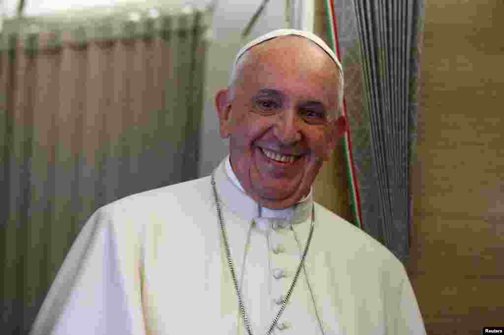 Pope Francis is pictured abooard his aircraft while en route to the United States, Sept. 22, 2015