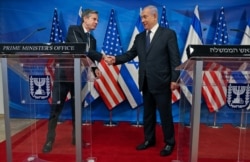 El primer ministro israelí Netanyahu y el secretario de Estado estadounidense Blinken celebran una conferencia de prensa conjunta en Jerusalén, el 25 de mayo de 2021.