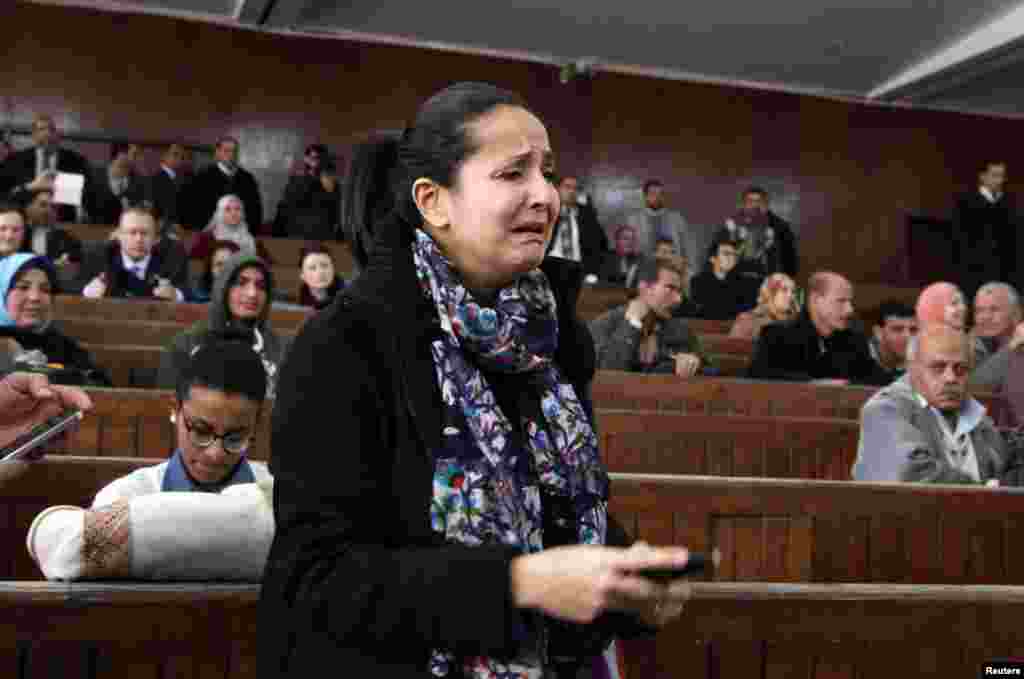 Al Jazeera International journalist Rawya Rageh reacts during the retrial of her Al Jazeera colleagues in a court in Cairo, Feb. 12, 2015.