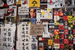 A Lennon wall is seen on the campus of Hong Kong Polytechnic University, in Hong Kong, Nov. 23, 2019.